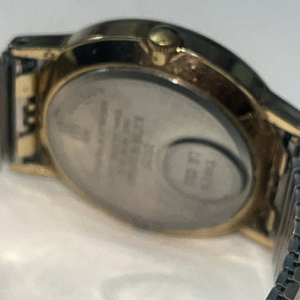 Vintage Gold Band Timex Watch. LA CELL. White Face. Metal Band. Needs Battery‎